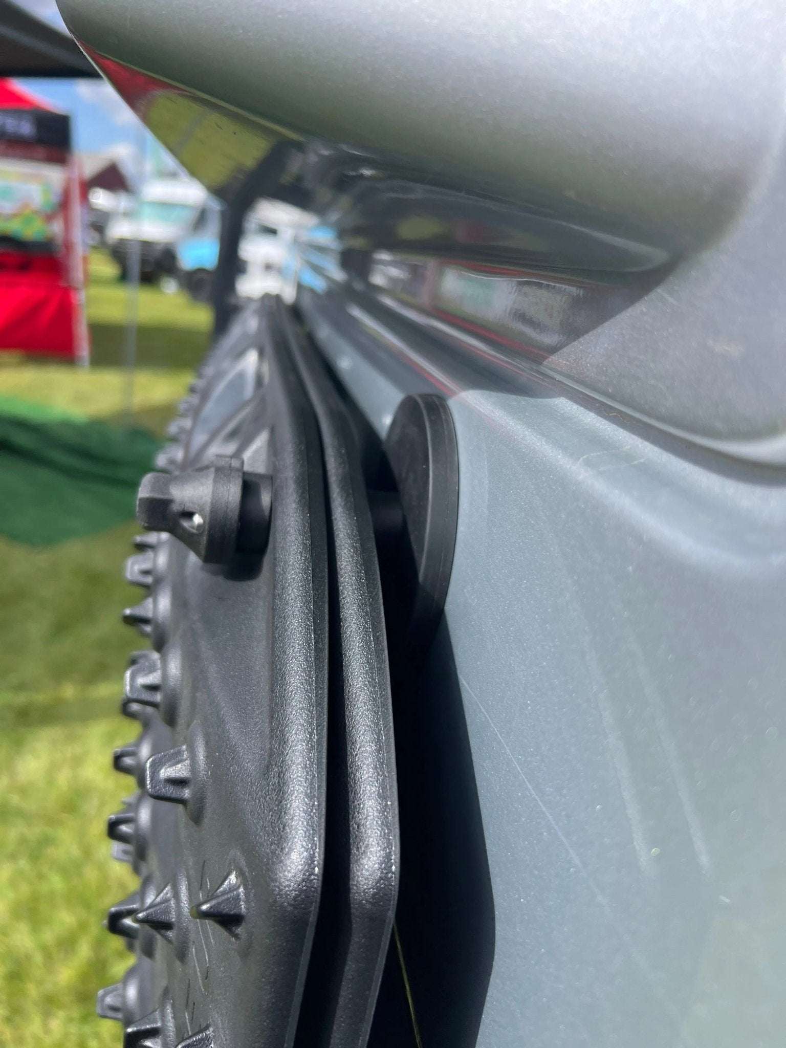 Magnetic Maxtrax Mounts for INEOS Grenadier attached to vehicle exterior.