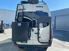 Mini Sherpa Carrier mounted on the back of a white van in an outdoor setting.