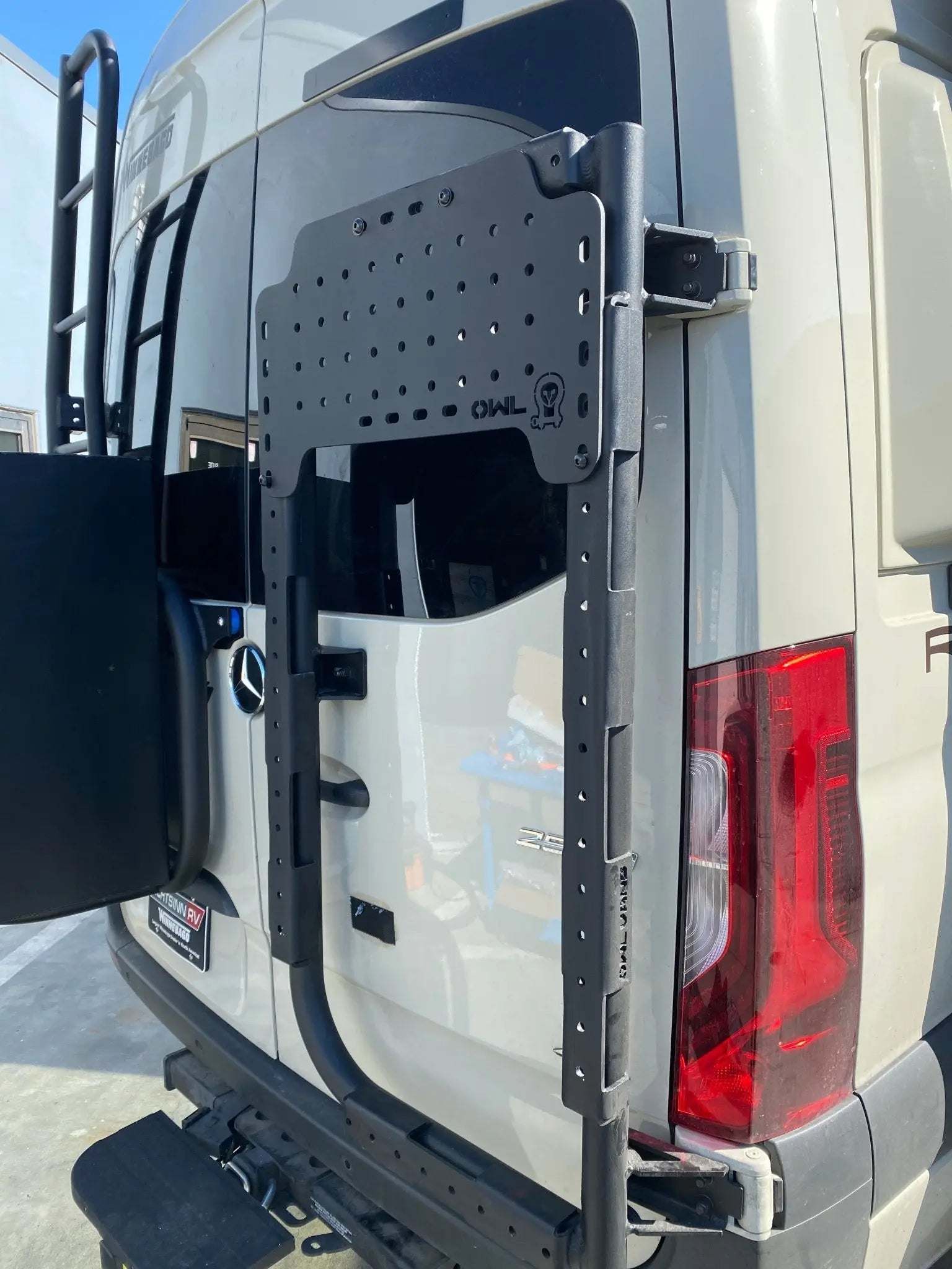 Mini Sherpa Carrier mounted on the rear of a van.