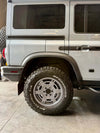 Mojo Wheels for INEOS Grenadier offering durability and a clean aesthetic, perfect for adventure and off-grid living.