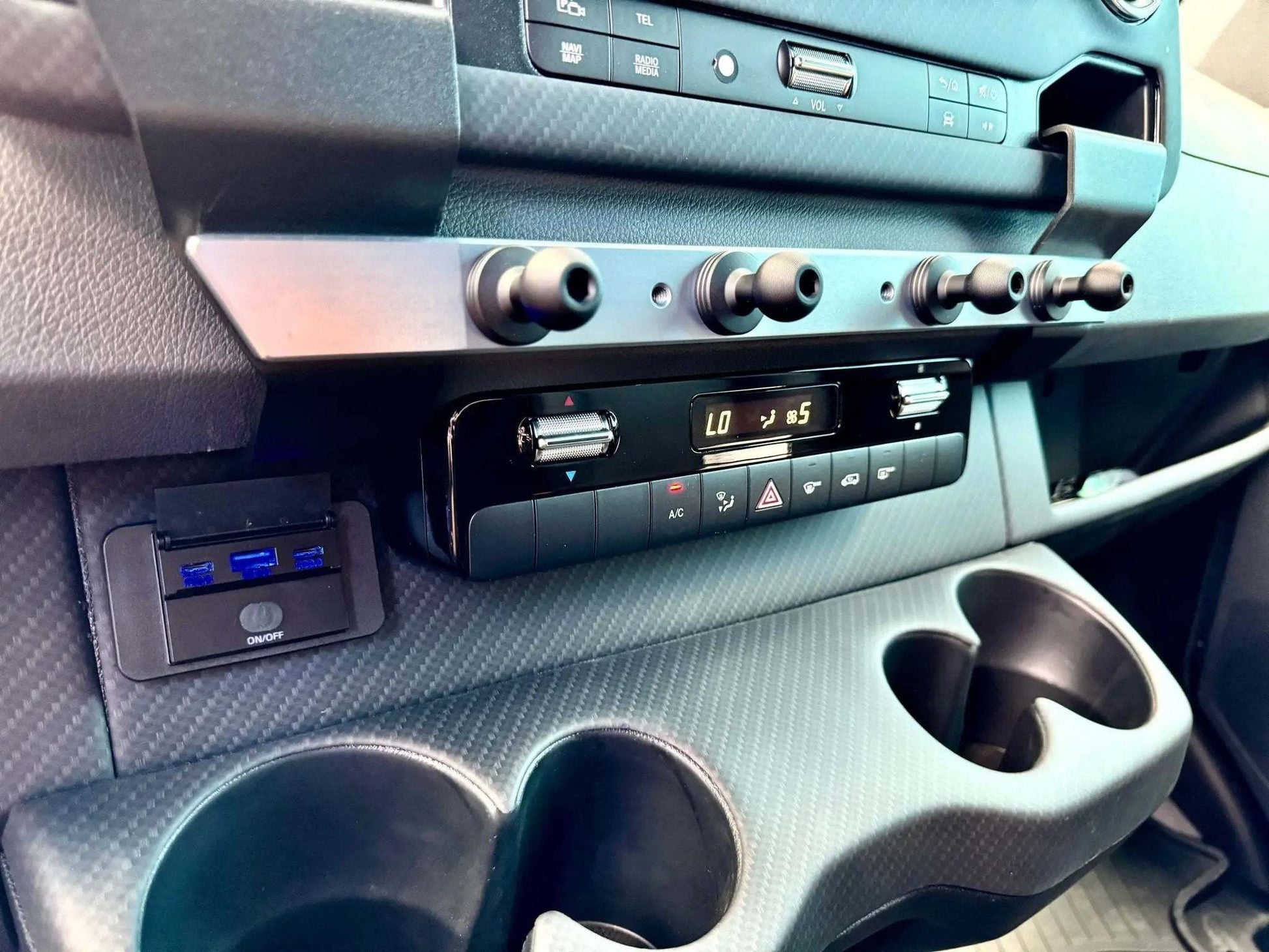 Powered Accessory Gear Rail for Sprinter, durable and seamless integration, enhances off-grid vehicle utility.