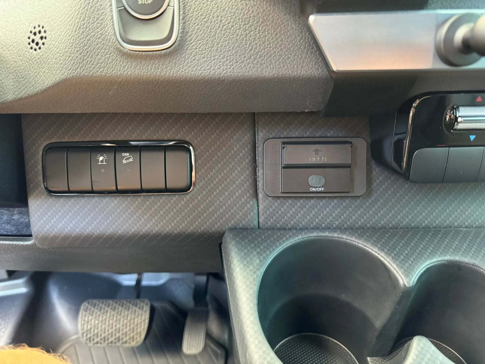 Powered Accessory Gear Rail installed in Sprinter dashboard.