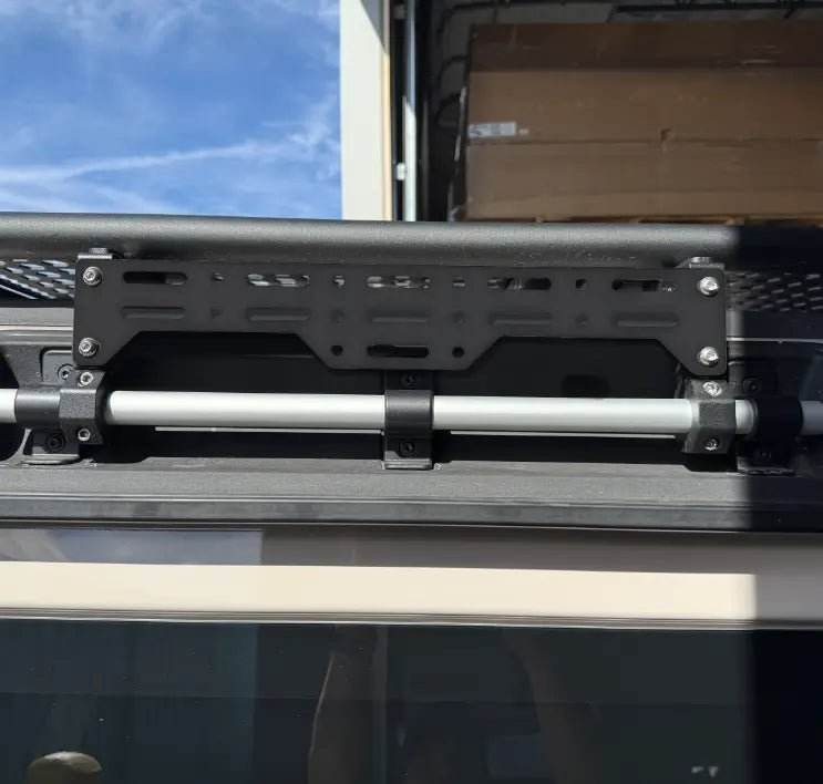 Roof rack gear panel mounted on INEOS Grenadier, featuring Owl’s signature hole and slot design for enhanced carrying capacity.