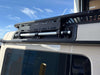 Roof rack gear panels for INEOS Grenadier with Owl's signature hole and slot design mounted on a vehicle.