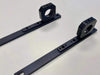 Roof rack traction board mount pair made of powder-coated aluminum for secure gear storage.