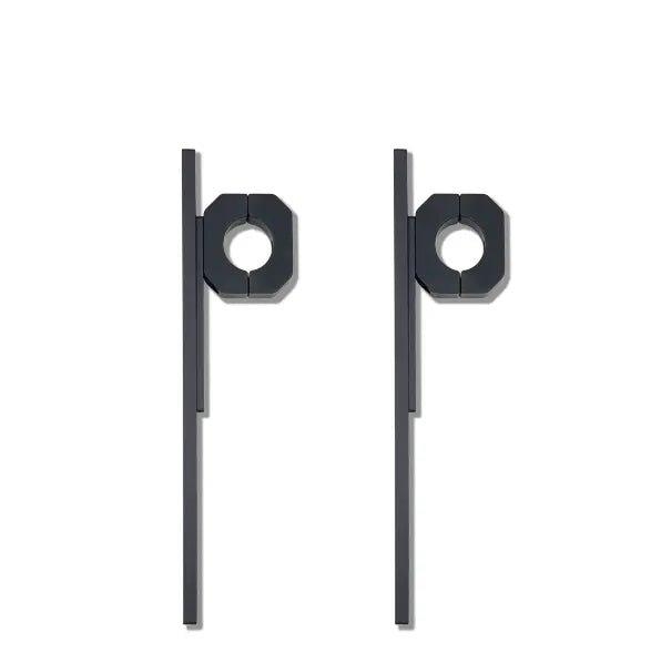 Roof rack traction board mount pair for secure recovery gear attachment.