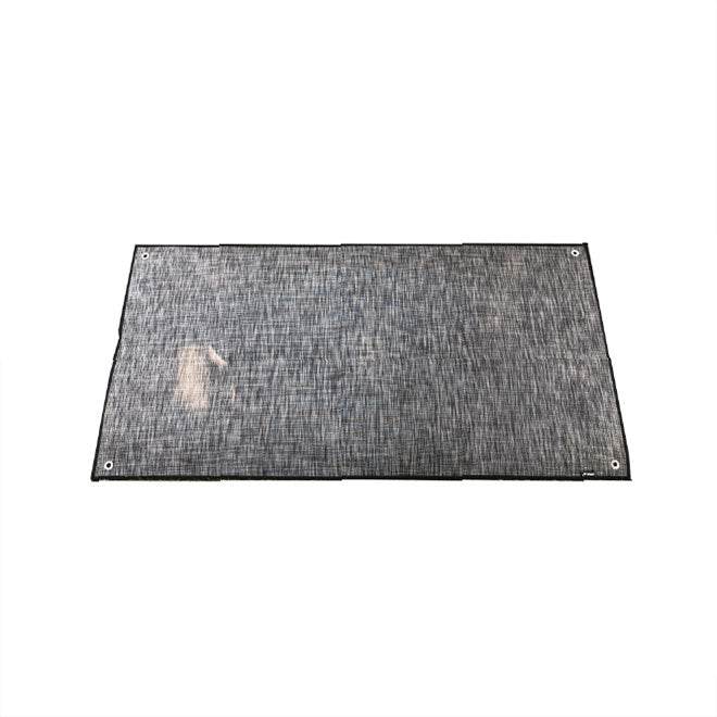 Small outdoor area rug suitable for camping, compact and easy to clean.