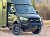 Sprinter van equipped with Talon Super Single off-road wheel set in desert setting