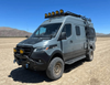 Super Single Spare Wheel mounted on off-road Sprinter van in desert terrain