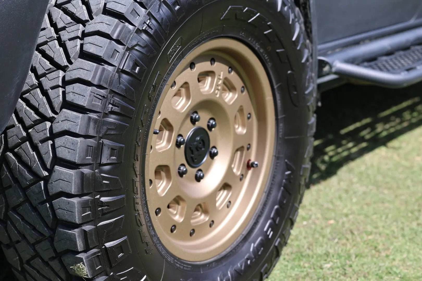 Super Single Spare Wheel with aggressive tread and matte bronze rim for off-road use on Sprinter vehicles