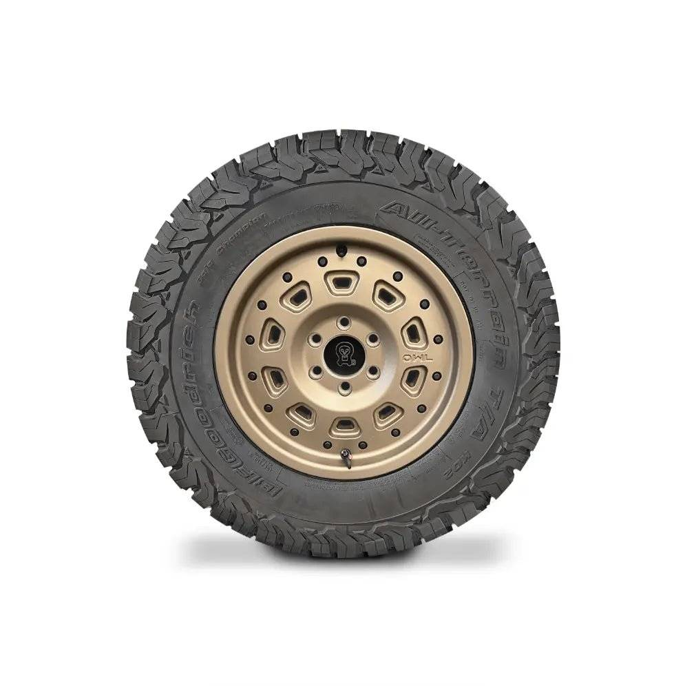 Matte black Super Single Spare Wheel for Ekko with rugged off-road tire and Owl logo center cap