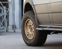 Super Single Spare Wheel on off-road Sprinter with matte black finish and aggressive tread design