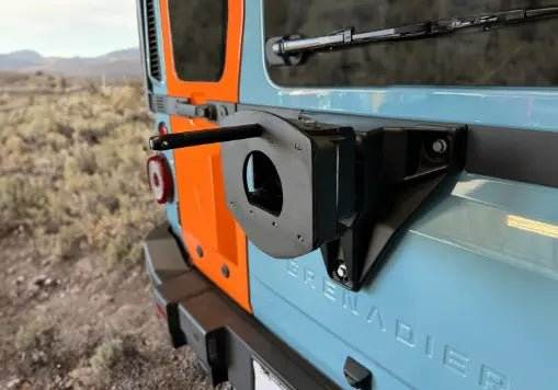 Tire Relocation Bracket for INEOS Grenadier mounted, showcasing durability and seamless integration.