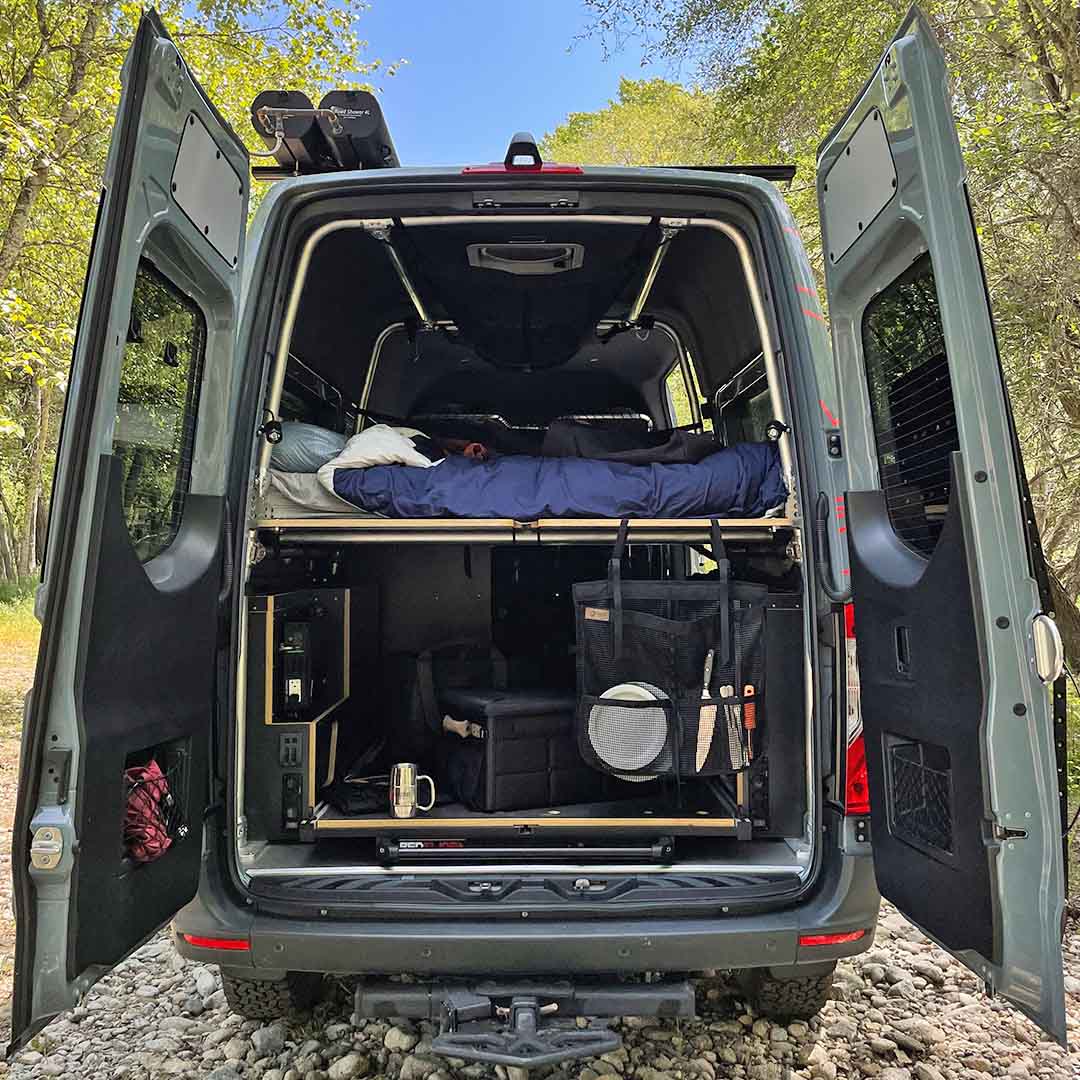 Van setup featuring the Camp Dish Drying Bag for efficient air-drying of dishes.