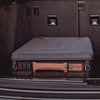Gear Box 3500 inside vehicle, rugged ABS construction with secure latches, ideal for travel storage.