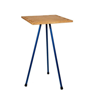 Kickstand Camping Table with durable design and blue legs, ideal for overland setups.