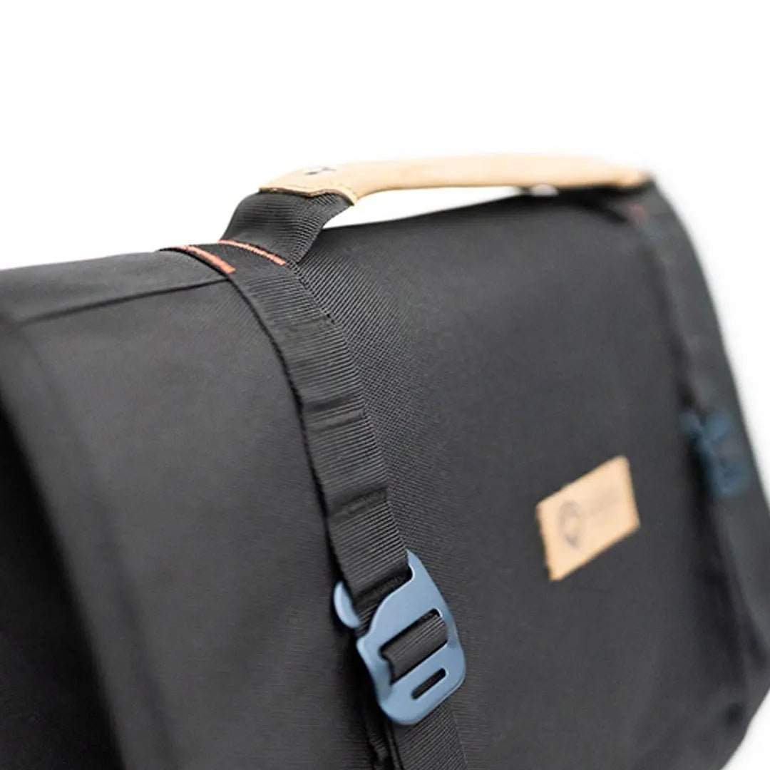 Large utility organizer with MOLLE-style loops and reinforced walls for structured storage.