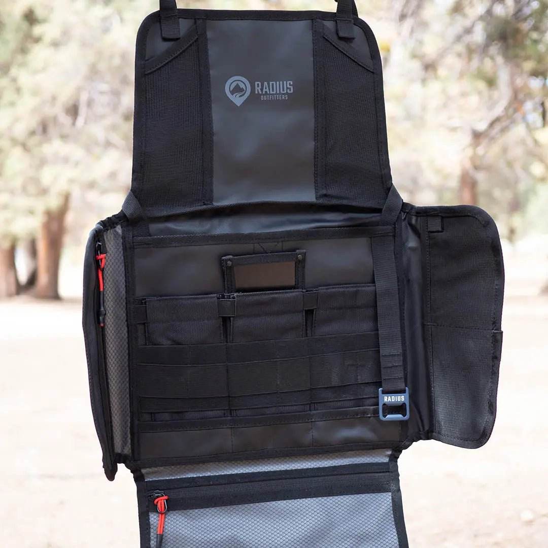 Small Utility Organizer with layered pockets for gear storage, rugged black design.