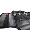 Small Utility Organizer with layered pockets for gear storage in rugged design.