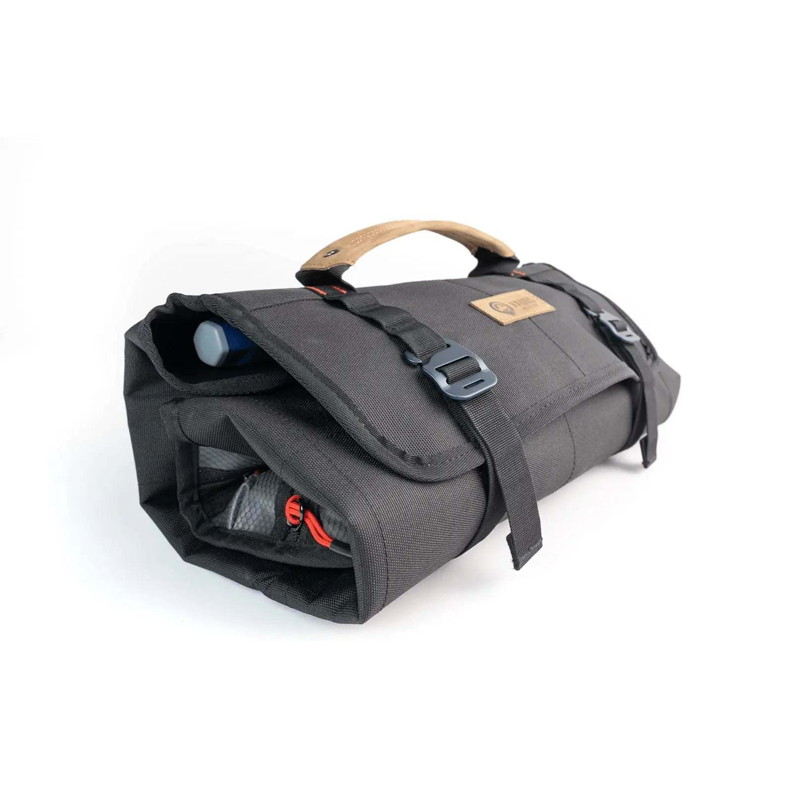 Compact and rugged tool wrap for organizing trail tools.