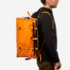 70L Storage Bag in use, showcasing durable and seamless design for adventure.