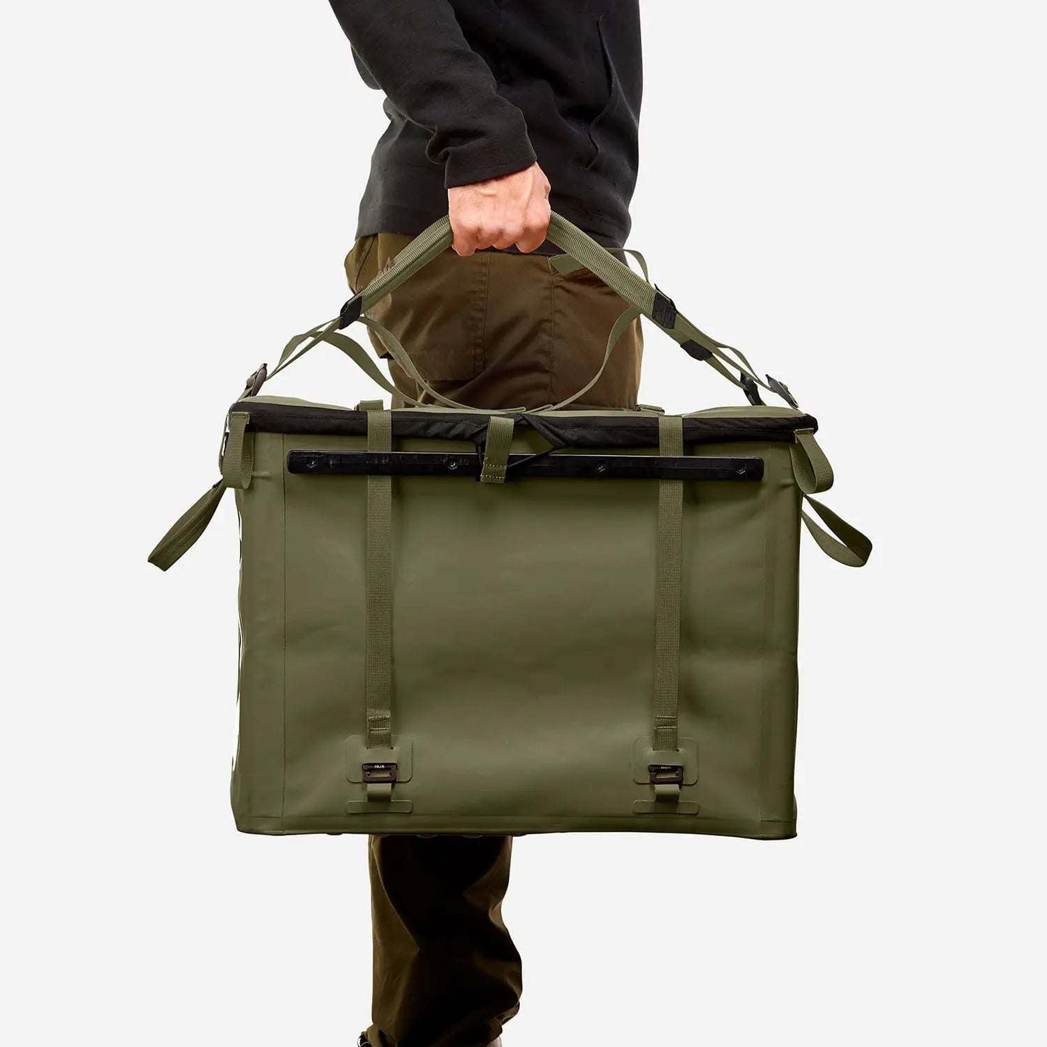 70L Storage Bag carried by a person, showcasing durability and functionality for adventure use.