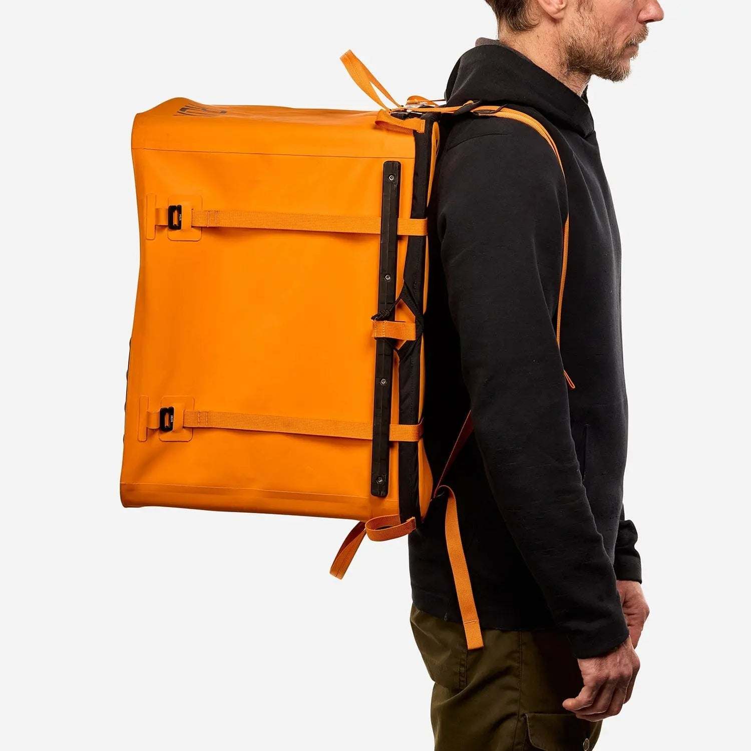 70L Storage Bag designed for durability and adventure, worn by a person.