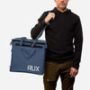 70L Storage Bag held by person, designed for durability and adventure use.