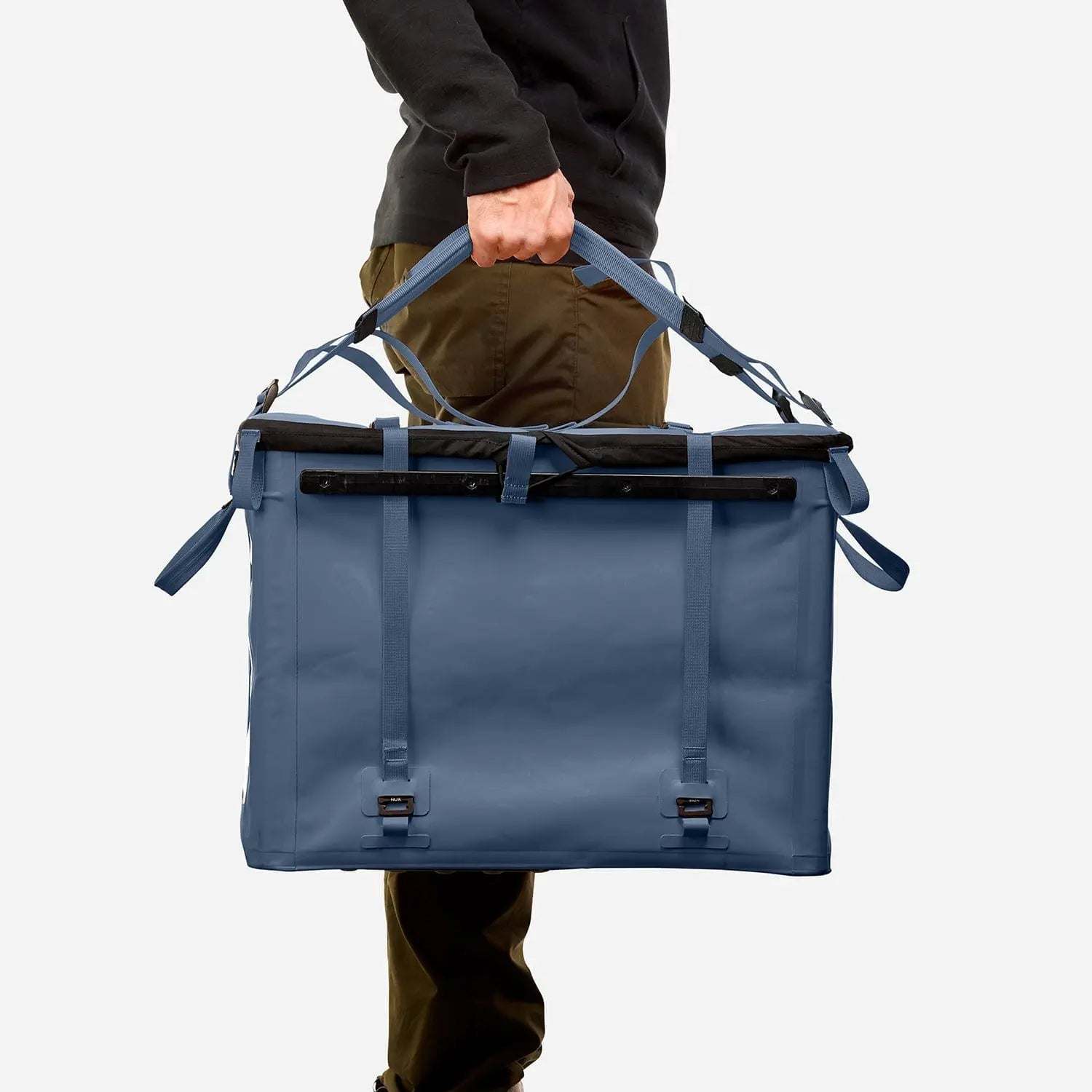 70L Storage Bag being carried, designed for durability and adventure.