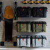 Utility hooks organizing gear for overland setup.
