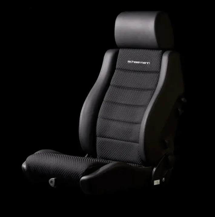 Vario F Cloth Seats for Sprinter in durable black material with ergonomic design.