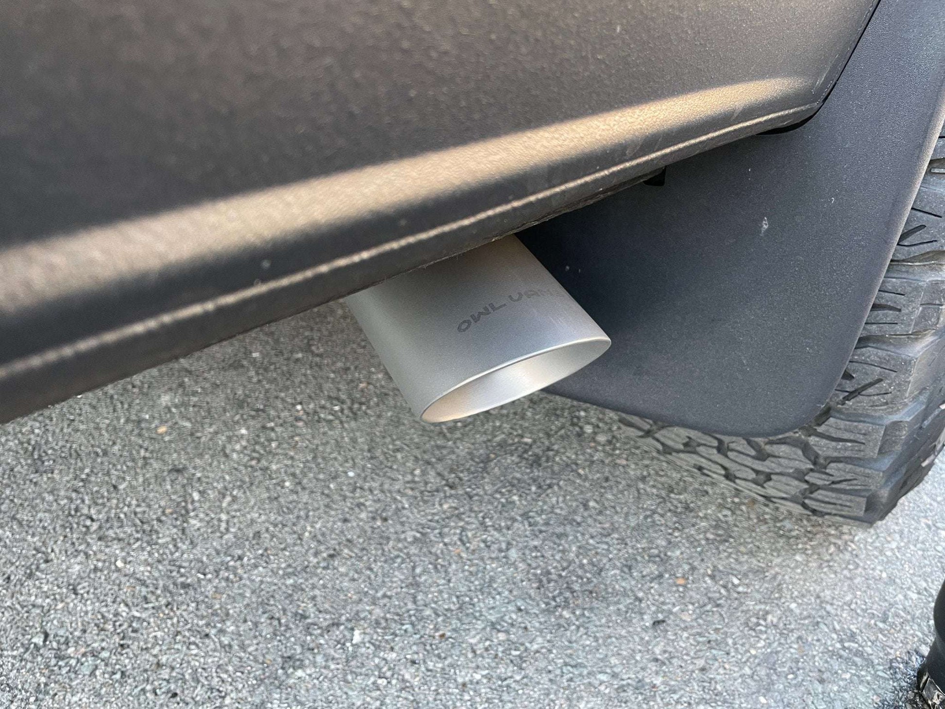 Owl Stainless Exhaust tip installed on 144" Sprinter van with bead blasted stainless steel finish