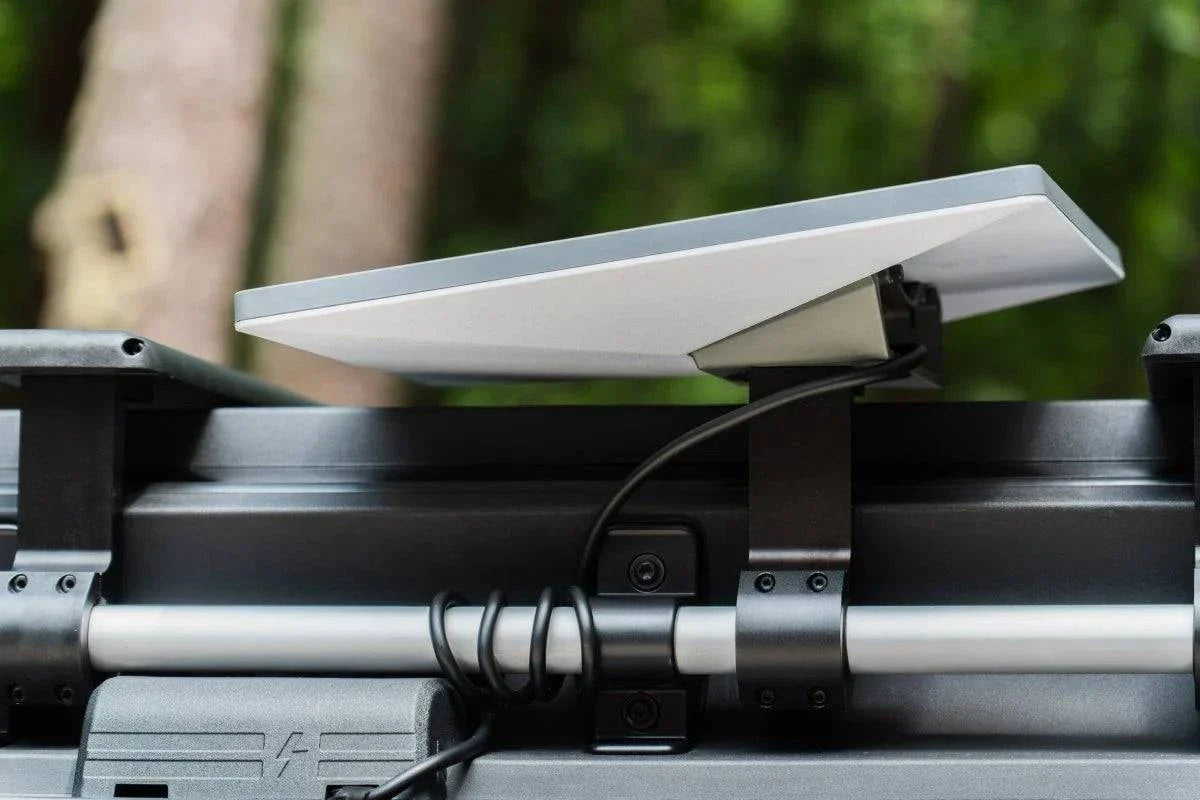 Starlink Mini Roof mount secured on Grenadier roof rail with adjustable, weatherproof aluminum bracket and anti-theft kickstand