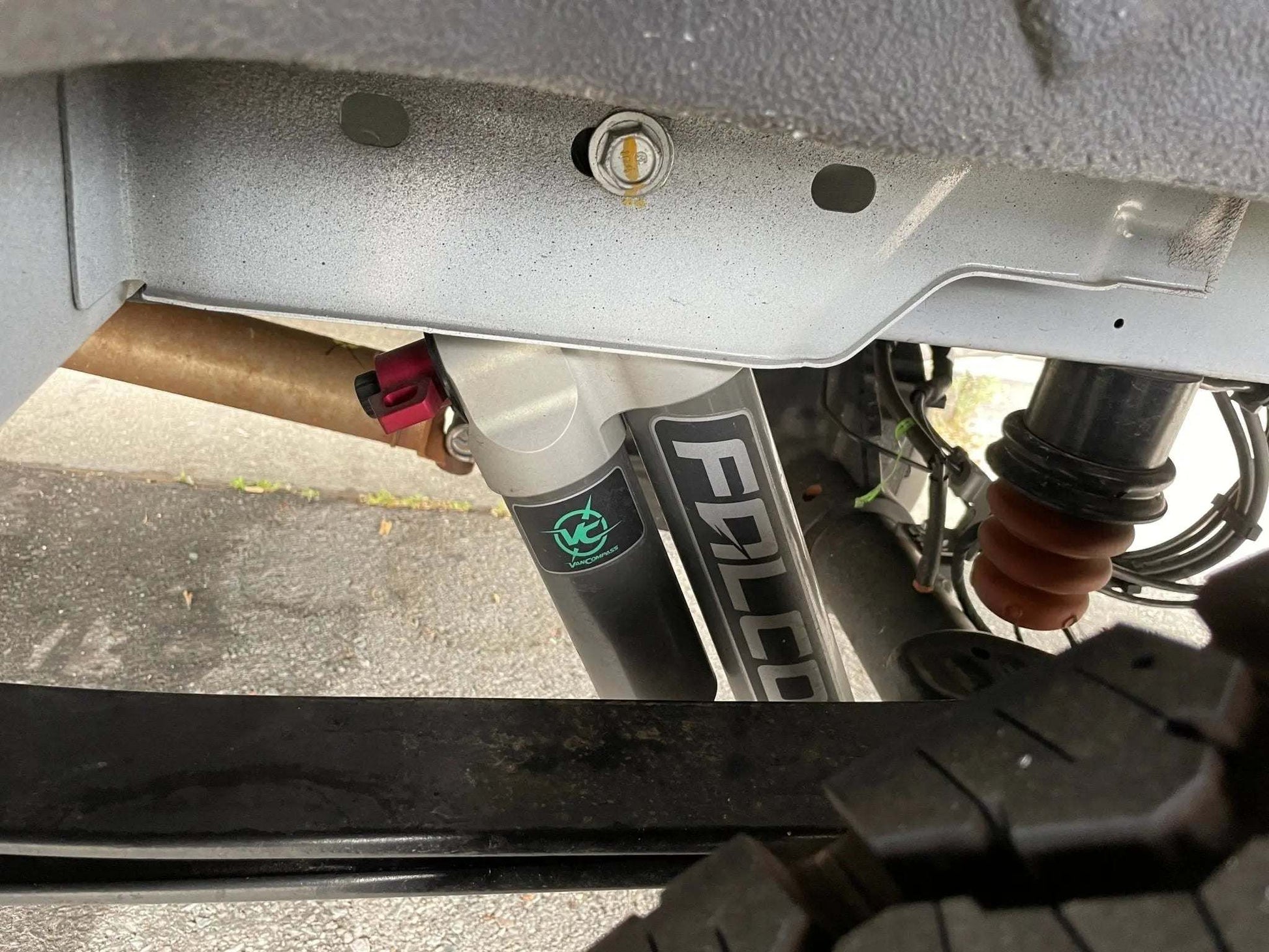 Stage 2 Topo 2.0 Suspension System for 2020+ Transit AWD, showcasing upgraded front and rear shocks with custom-tuned valving.