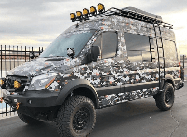 Van with Baja Designs LP9 LED lights with amber lens installed