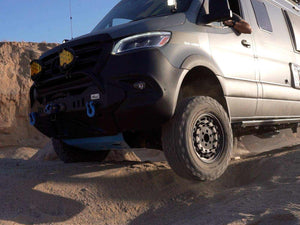 Van equipped with ARB Twin Air Compressor and Owl Vans Tire Carrier for off-road air and recovery tasks