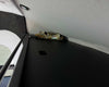 Transit headliner shelf with curtain rod installed inside van for durable and clean storage solution