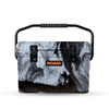 ROAM 20QT rugged cooler with black and gray speckled design and sturdy handle for travel and adventure use