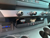Powered Accessory Gear Rail installed on Sprinter dashboard with USB hub and mounting holes for ball mounts
