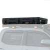 ROAM 83L Rugged Case mounted on vehicle roof with durable black storage container and lockable latches