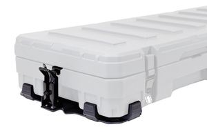 83L Rugged Mount quick-release black mounting system attached to white rugged case base for roof racks