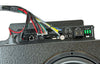 Ekko Beatbox Blackbird stereo upgrade amplifier and speaker wiring close-up on textured black speaker enclosure