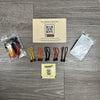 Sprinter Rear Window Covers CLIMA-SHADE insulated kit with color-coded bungee cords and installation instructions on wooden floor
