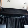Black insulated Sprinter Curtain with magnetic tabs for temperature control and privacy between cab and living space