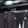Black dual-layer insulated Sprinter Curtain with magnetic tabs for temperature control and privacy between cab and living space