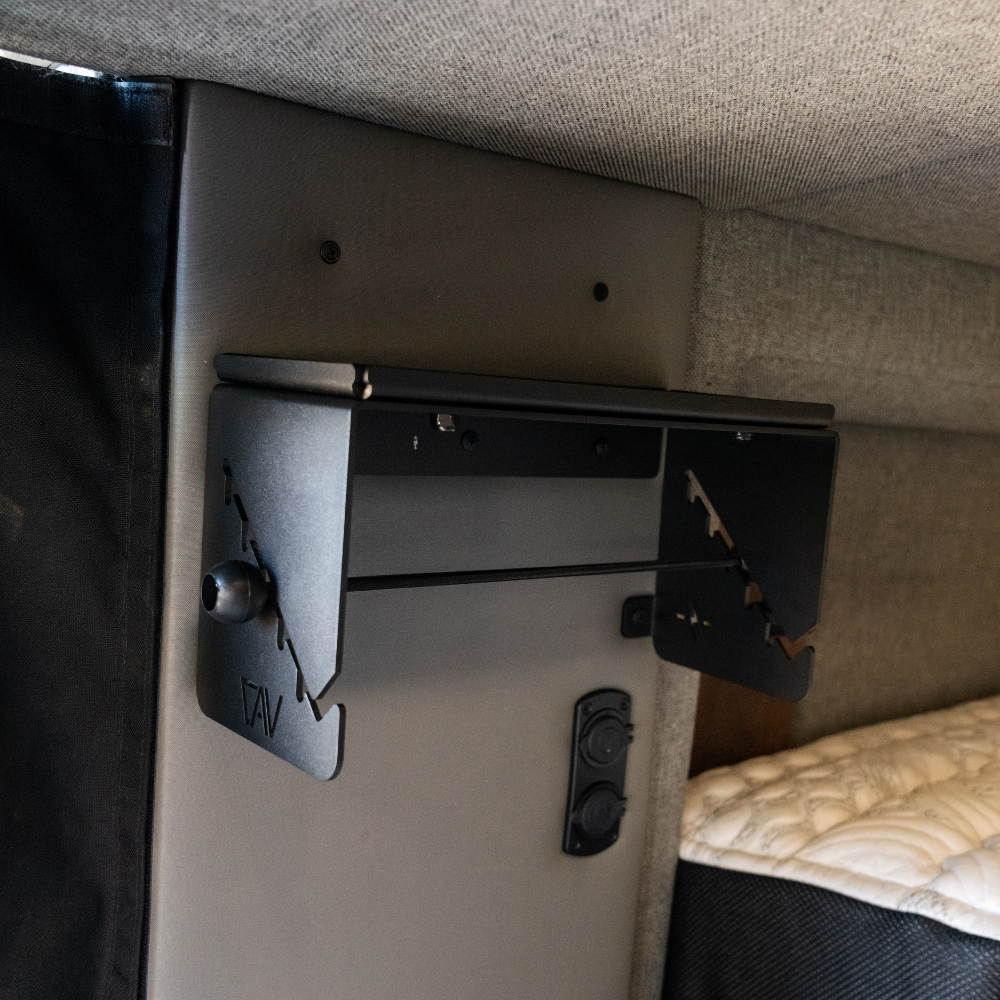 Canyon Paper Towel Holder mounted with magnets on van wall, black metal design, organized storage solution