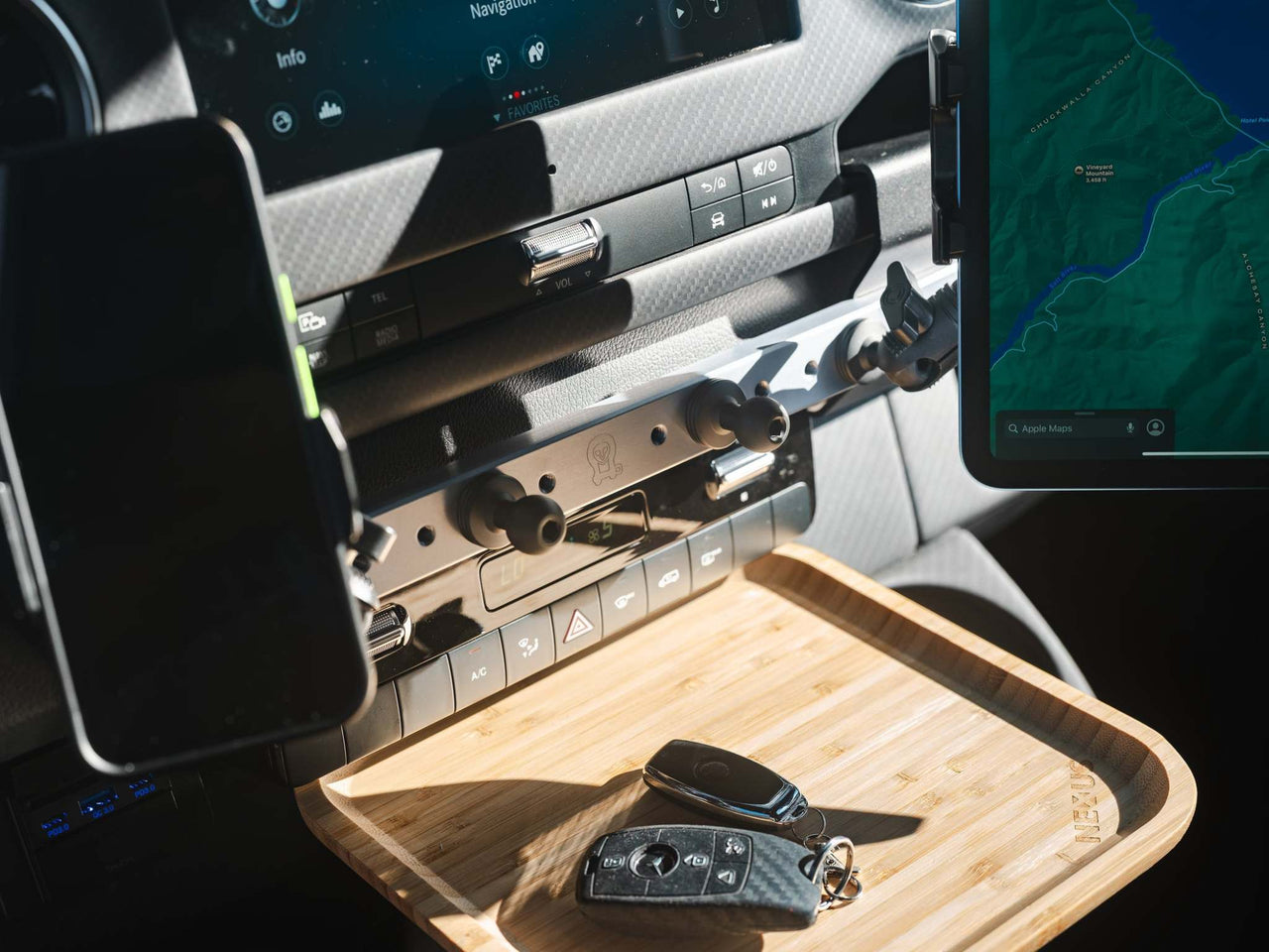Powered Accessory Gear Rail mounted on Sprinter dashboard with phone, tablet holders and USB hub