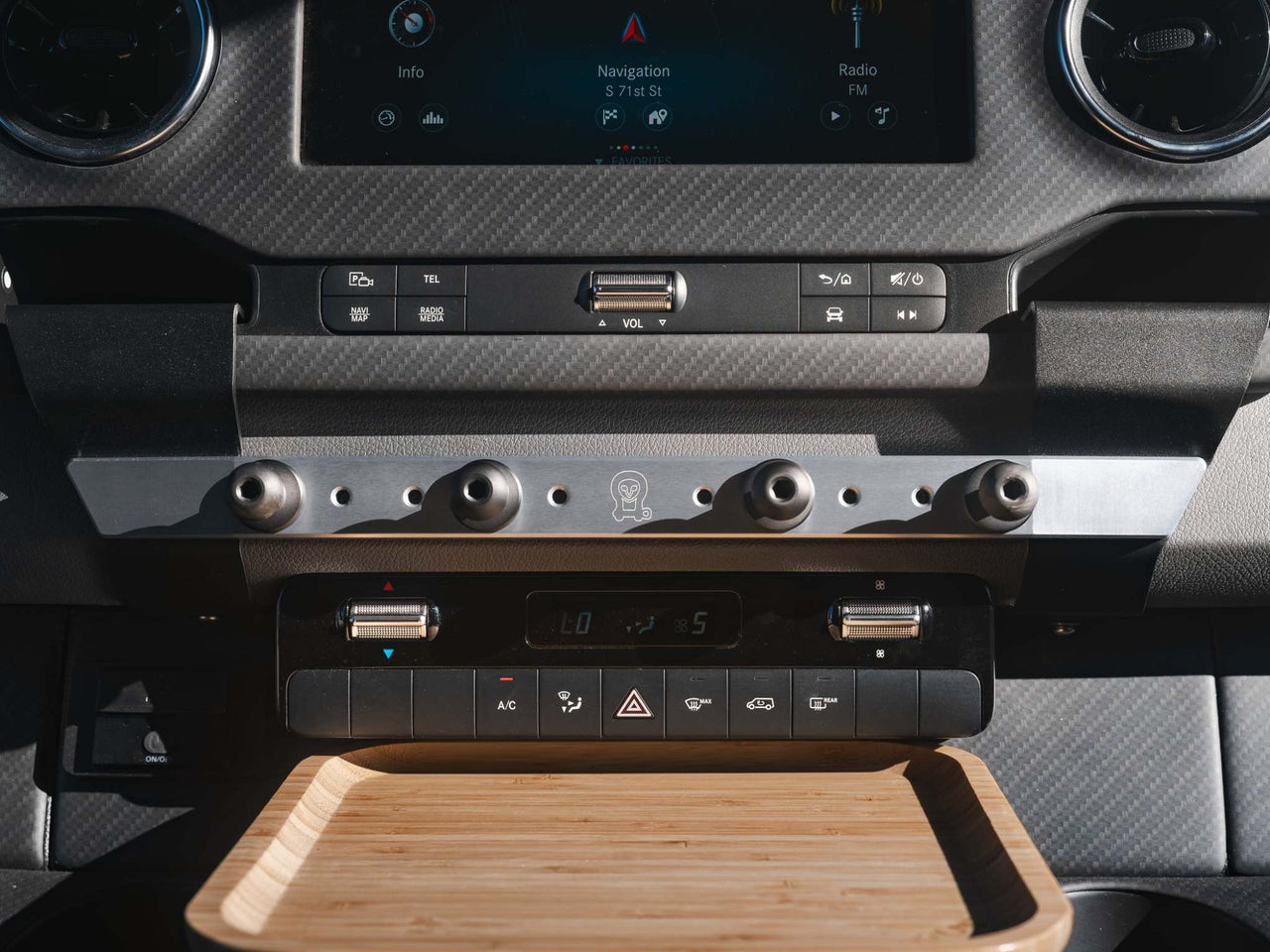 Powered Accessory Gear Rail mounted on Sprinter dashboard with multiple ball mount positions and USB hub integration