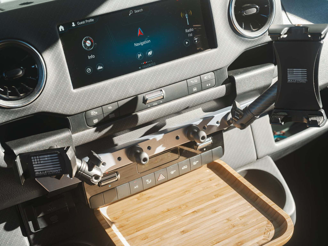 Sprinter dashboard with powered accessory gear rail and adjustable mounts for electronic devices