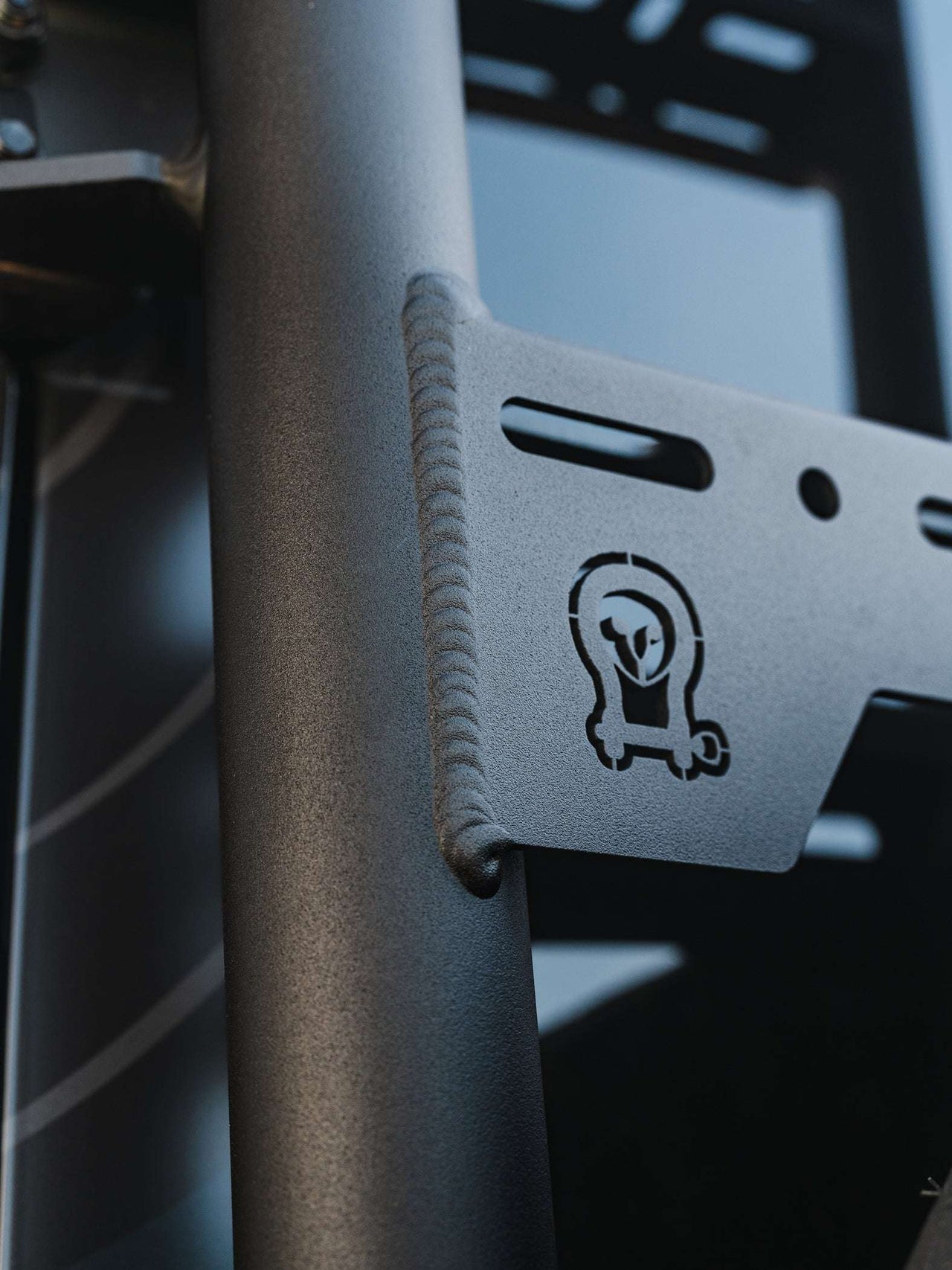 Close-up of Owl emblem on a ladder and tire carrier